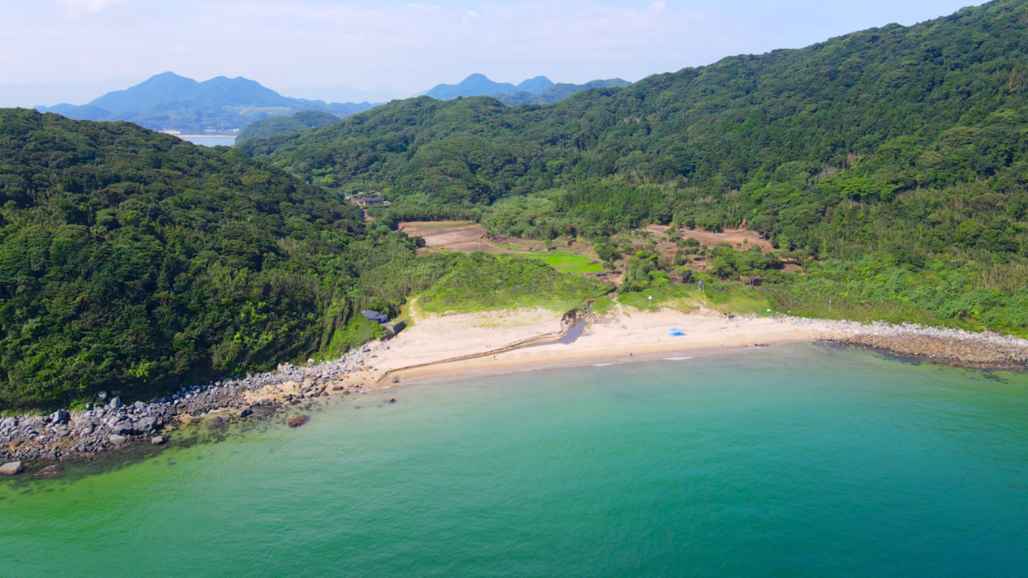Turquoise coastline and beach at Karadomari Village